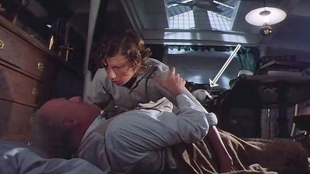 Warlords of Atlantis - Sandy Ashley Knight and Professor Aitken Donald Bisset in boat cabin with Siamese cat