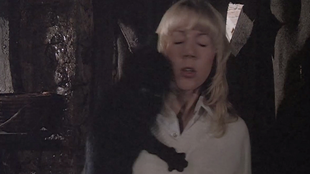 The Watcher in the Woods - black cat jumping on Jan Lynn-Holly Johnson
