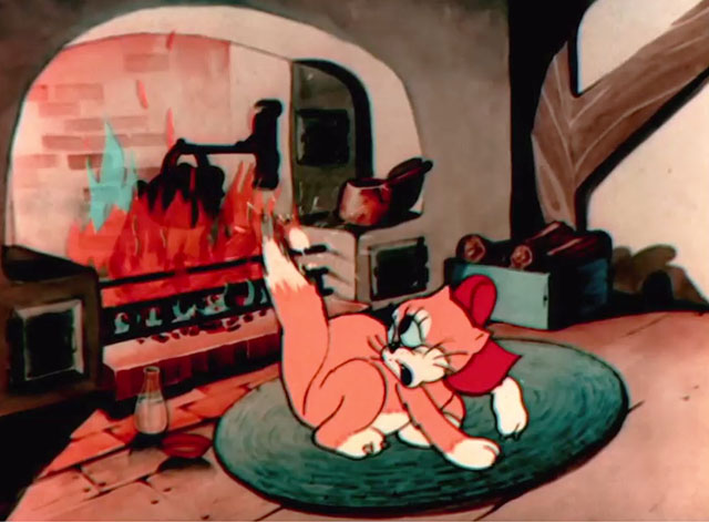 When the Cat's Away - orange and white cartoon cat with red bow flicking ember back into fireplace with tail