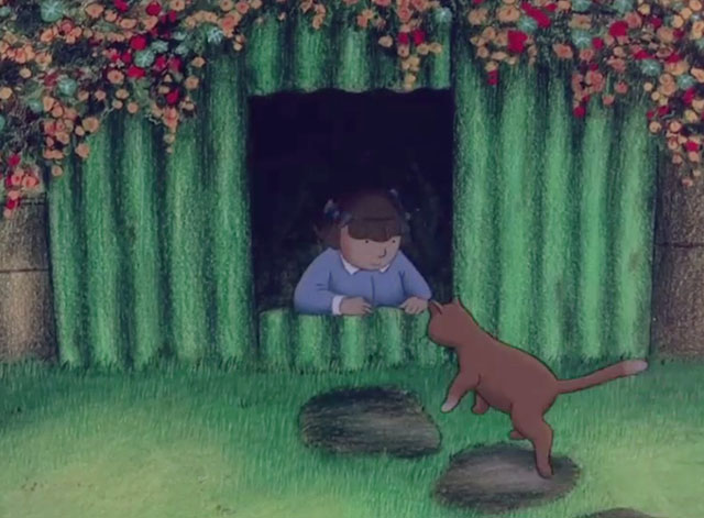 When the Wind Blows - little girl Hilda with cartoon brown cat outside bomb shelter
