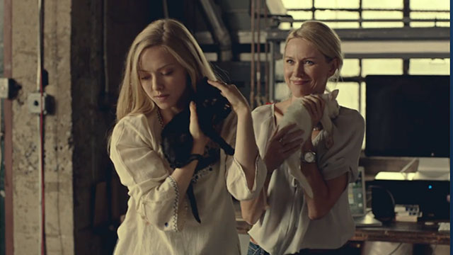 While We're Young - Cornelia Naomi Watts holding white kitten Good Cop with Darby Amanda Seyfriend holding black kitten Bad Cop