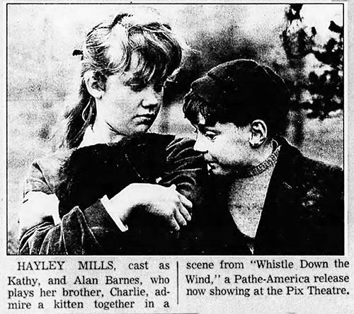 Whistle Down the Wind - Kathy Hayley Mills and Charlie Alan Barnes with kitten in newspaper article