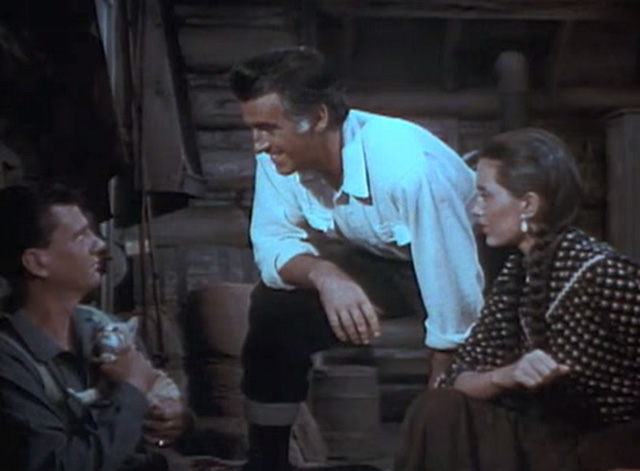 The Wild North - yellow tabby kitten held by Mountie Pedley Wendell Corey