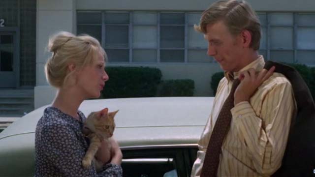 Willard - Joan Sandra Locke holding orange tabby cat Chloe with Willard Bruce Davison