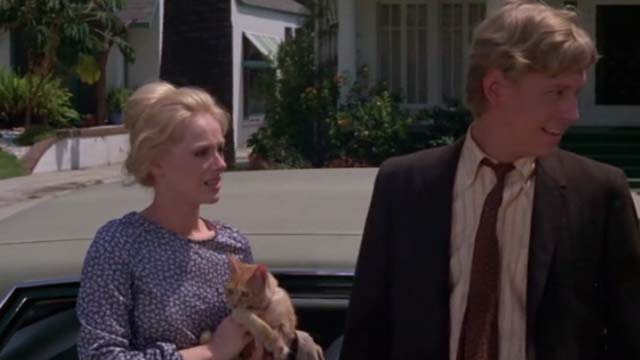 Willard - Joan Sandra Locke holding orange tabby cat Chloe with Willard Bruce Davison