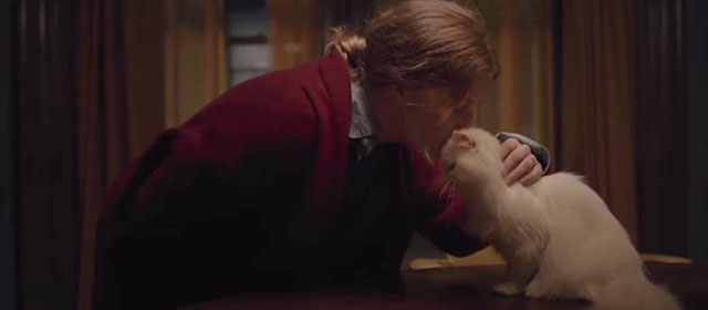 The Woman in the Window - white Persian cat Punch being kissed by Anna Amy Adams