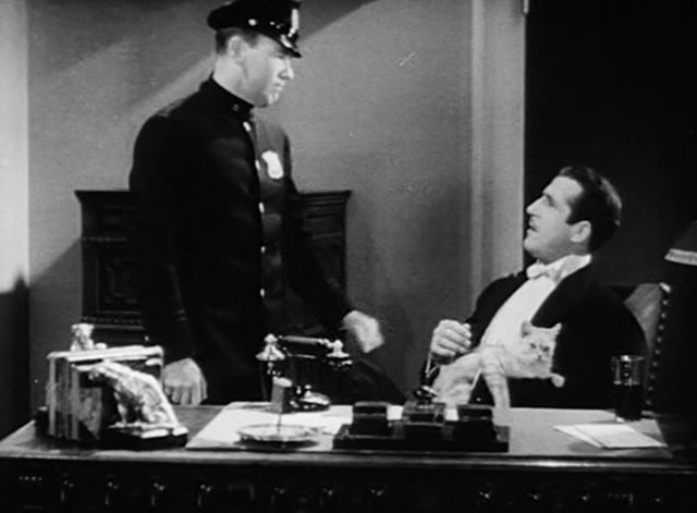 The Woman Racket - Tom Moore and Chris John Miljan with longhair tabby cat on lap