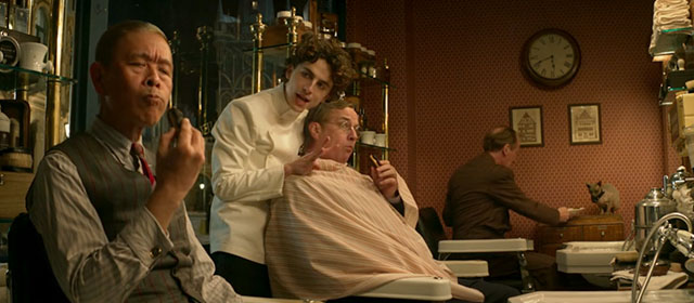 Wonka - Timothée Chalamet in barber shop with bald customers and hairless Sphynx cat