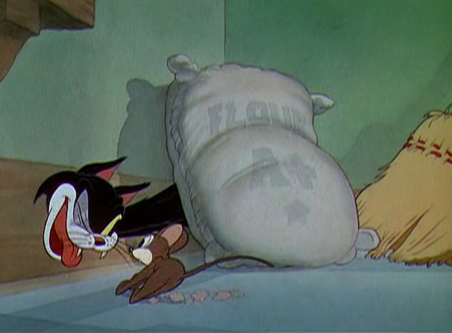 The Worm Turns - black and white cartoon cat chasing mouse