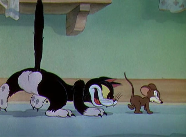 The Worm Turns - black and white cartoon cat chasing mouse