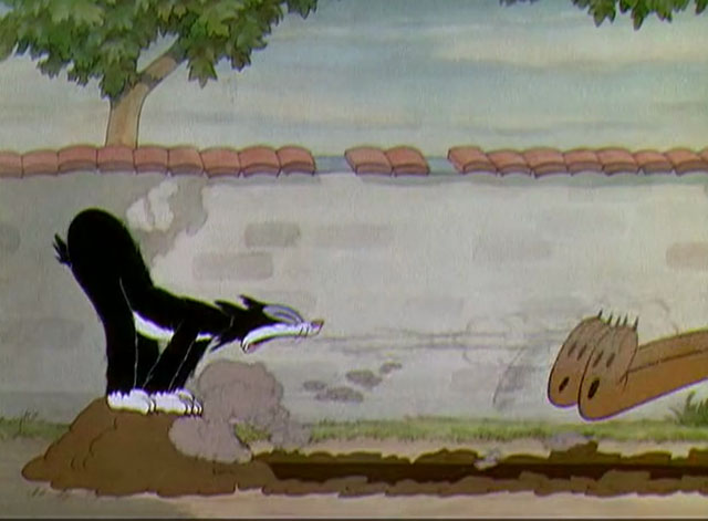 The Worm Turns - black and white cartoon cat yowling at Pluto
