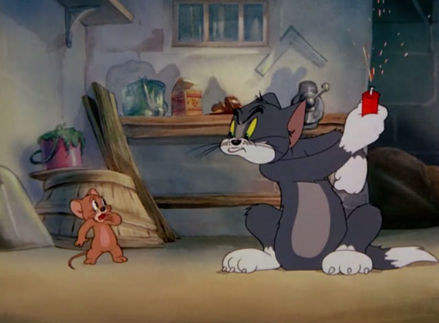 The Yankee Doodle Mouse - Tom cartoon cat taking firecracker away from Jerry mouse