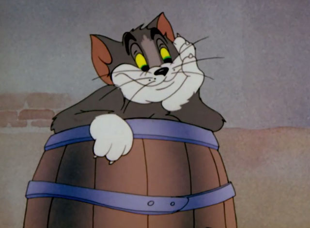 The Yankee Doodle Mouse - Tom cartoon cat smiling while sitting in barrel