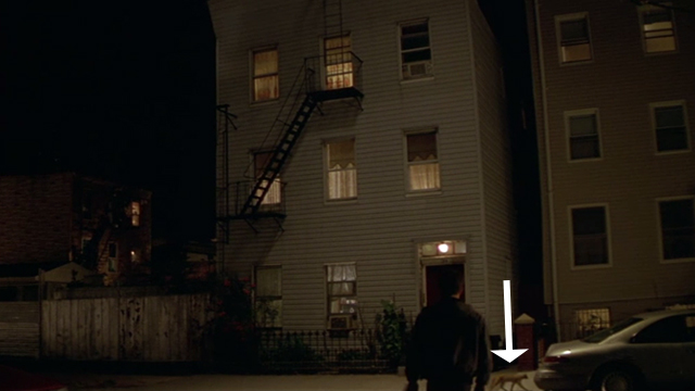 The Yards - orange tabby cat on sidewalk as Leo Matt Wahlberg approaches house