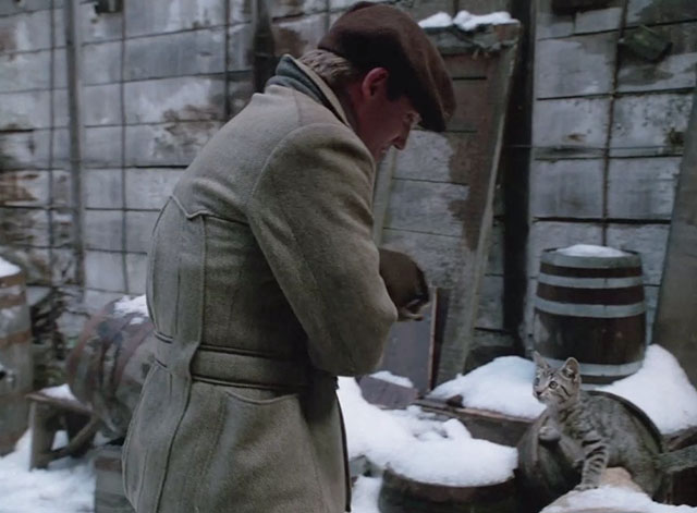 Yes Virginia, There is a Santa Claus - James O'Hanlan Richard Thomas with brown tabby kitten in snowy back alley