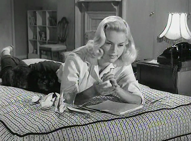 Yield to the Night - Mary Diana Dors lying on bed with tortoiseshell cat