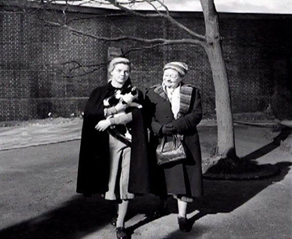 Yield to the Night - Mary Diana Dors carrying tuxedo cat with Miss Bligh Athene Seyler