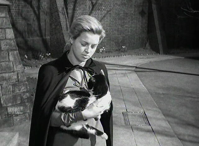 Yield to the Night - Mary Diana Dors carrying tuxedo cat outside prison