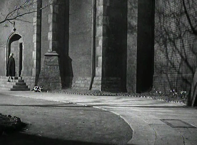 Yield to the Night - Mary Diana Dors walking into prison as tuxedo cat moves away