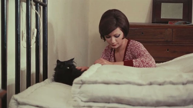 Your Vice is a Locked Room and Only I Have the Key - Floriana Edwige Fenech on bed with longhair black cat Satan
