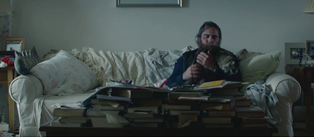 You Were Never Really Here - Joe Joaquin Phoenix petting torbie cat on couch