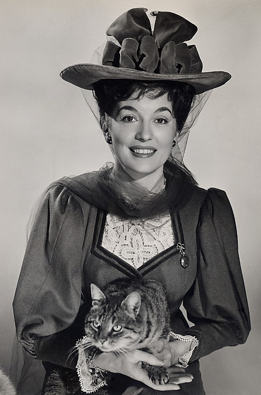 The Shadow of the Cat - promotional photo of Elizabeth Barbara Shelley holding tabby cat Tabitha