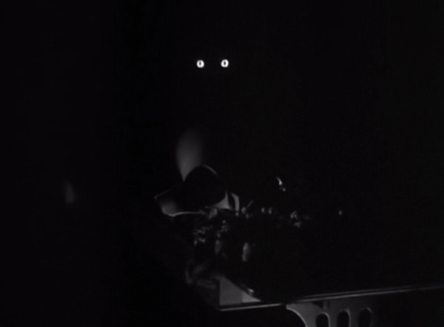 Alfred Hitchcock Presents - Fog Closing In - cat's eyes staring out from darkness