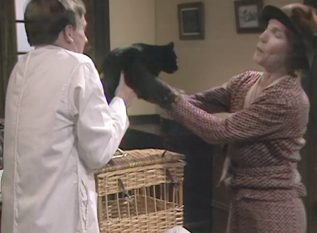 All Creatures Great and Small - Judgement Day - James Herriot Christopher Timothy and Mrs. Bond Sonia Graham trying to get Boris the black cat back in carrier