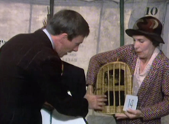 All Creatures Great and Small - Judgement Day - James Herriot Christopher Timothy and Mrs. Bond Sonia Graham looking at Boris the black cat back in carrier