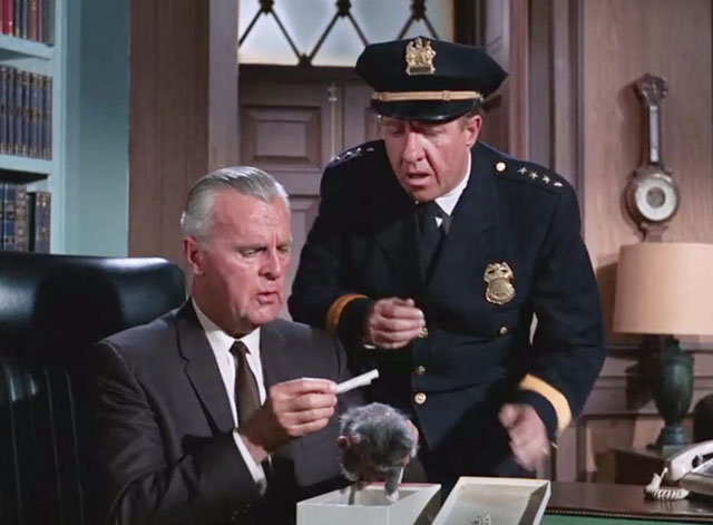 Batman - The Purr-fect Crime - Commissioner Gordon Neil Hamilton holding gray and white kitten with Chief O'Hara Stafford Repp