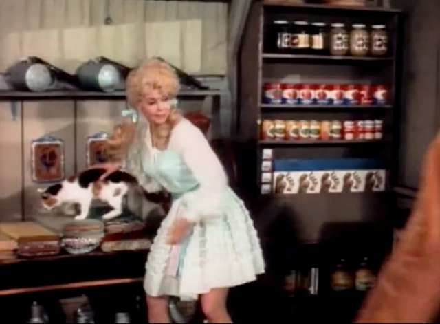 The Beverly Hillbillies - Buzz Bodine, Boy General - Elly May Clampett Donna Douglas setting down calico cat Marmalade in Sam Drucker's store