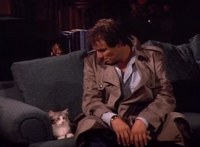 Bob - Mad Dog Returns - Harlan Stone John Cygan looking at cat Otto on couch