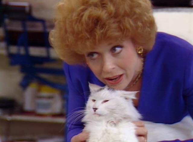 Bosom Buddies - On the Road to Monte Carlo - close up of Ruth Holland Taylor with white cat with black markings Pansy