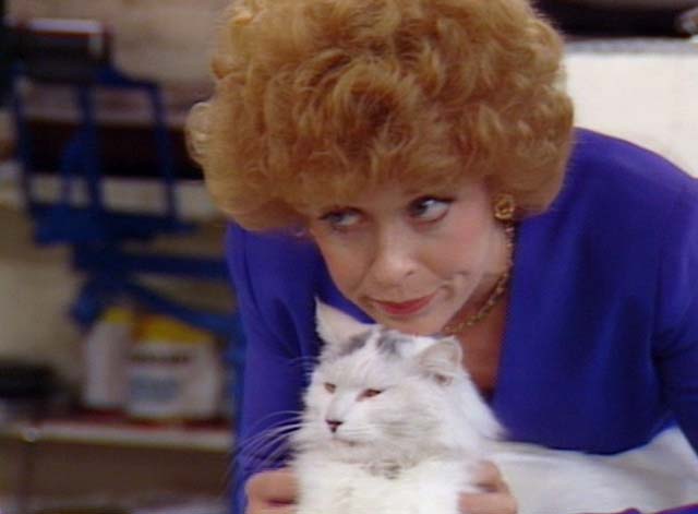 Bosom Buddies - On the Road to Monte Carlo - close up of Ruth Holland Taylor with white cat with black markings Pansy