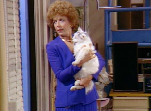 Bosom Buddies - On the Road to Monte Carlo - Ruth Holland Taylor holding white cat with black markings Pansy