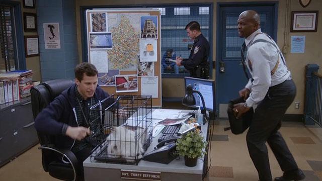 Brooklyn Nine-Nine - Terry Kitties - Peralta Andy Samberg with three Himalayan kittens in cage on desk and Terry Crews