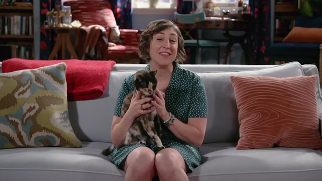 Call Me Kat - Plus One - Kat Mayim Bialik with tortoiseshell cat Firework Piper on her lap