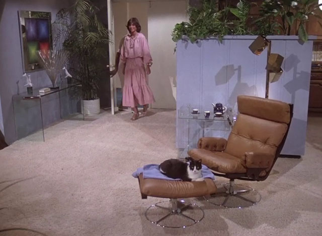 Charlie's Angels - Angels in Vegas - Sabrina Kate Jackson entering luxury suite with tuxedo cat on ottoman