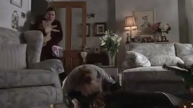 Coronation Street - ginger tabby cat Arthur being carried into room as Jenny and Mary find Rita