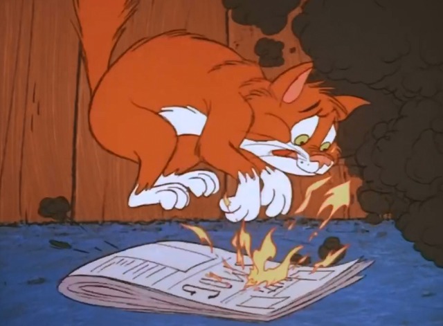 The Cricket in Times Square - Harry cat trying to put out fire
