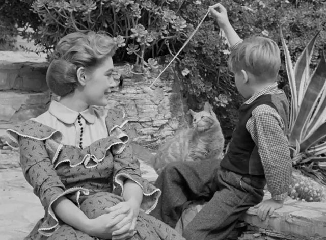 Death Valley Days - Faro Bill's Layout - ginger cat Samantha Orangey playing with cork on string held by Butch Gary Hunley with Grace Diane Brewster