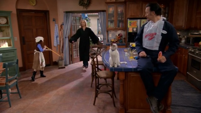 Ralph Steve Valentine and cat actor Frosty watching Chloe Francesca Capaldi and Ellen Beth Littleford