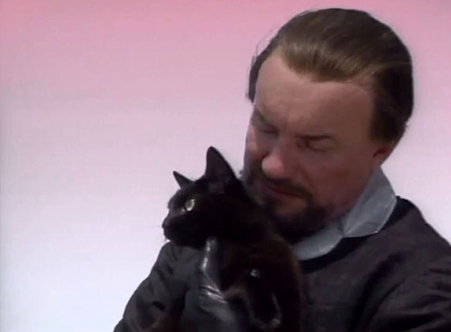 Doctor Who - Survival - black cat Kitling being held by the Master Anthony Ainley