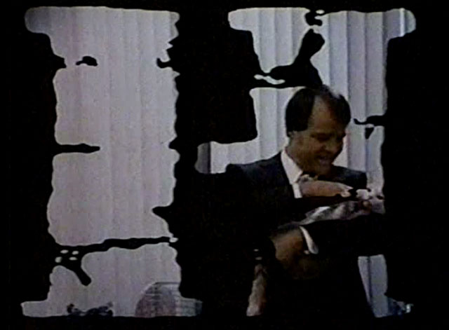 Eischied - Only the Pretty Girls Die - theme song Joe Don Baker holding ginger and white tabby cat P.C. Waldo Kitty