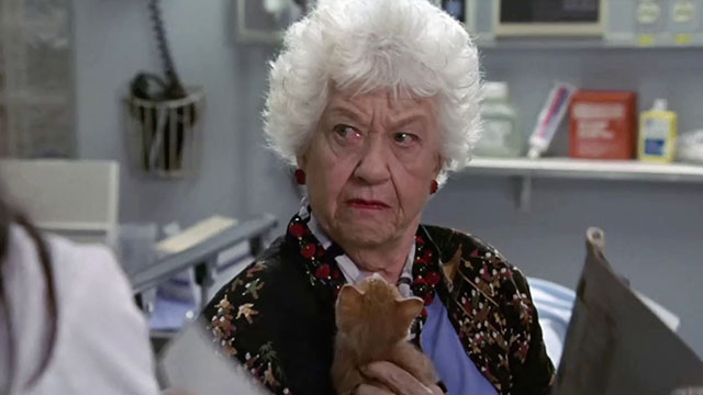 ER - Tandem Repeats - Roxanne Charlotte Rae holding ginger tabby kitten Purdy