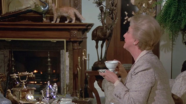 Fantasy Island - Beachcomber / The Last Whodunnit - Mabel Celeste Holm drinking tea as ginger tabby cat Hercule walks on mantel