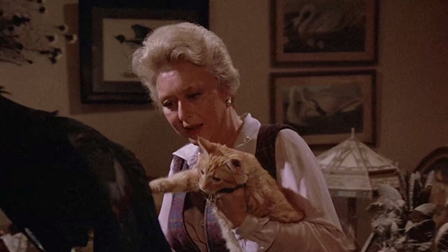 Fantasy Island - Beachcomber / The Last Whodunnit - Mabel Celeste Holm holding ginger tabby cat Hercule who is pawing at stuffed bird