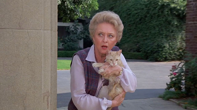 Fantasy Island - Beachcomber / The Last Whodunnit - Mabel Celeste Holm holding ginger tabby cat Hercule while looking around corner