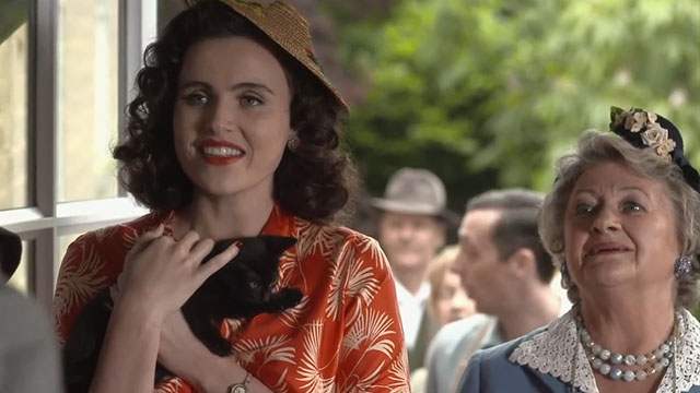 Father Brown - The Theatre of the Invisible - black kitten held by Bunty Emer Kenny with Mrs. McCarthy Sorcha Cusack