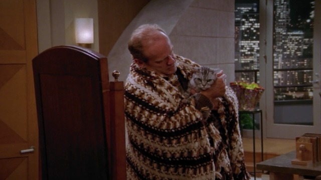 Frasier - The Placeholder - Frasier holds Mr. Bottomsley cat in his arms